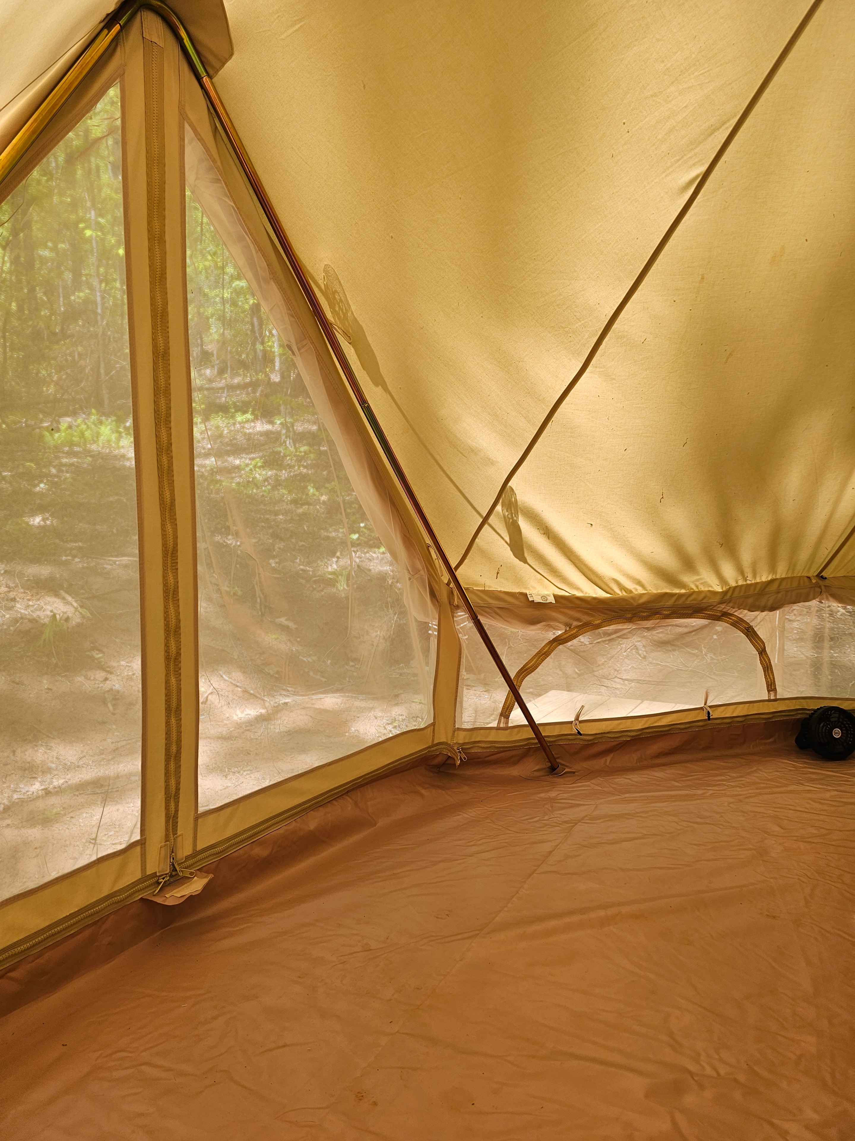 Tent interior with forest view
