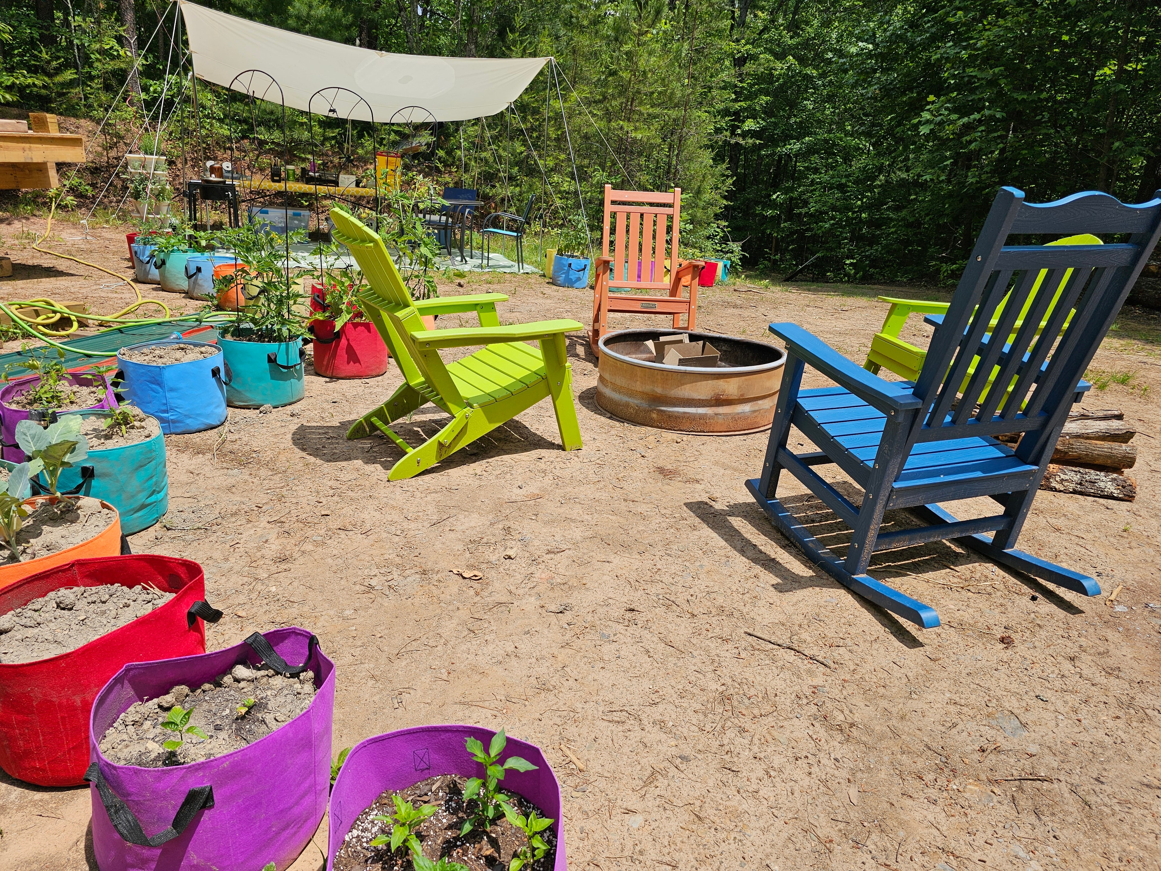 Garden fire pit gathering space at BLK147